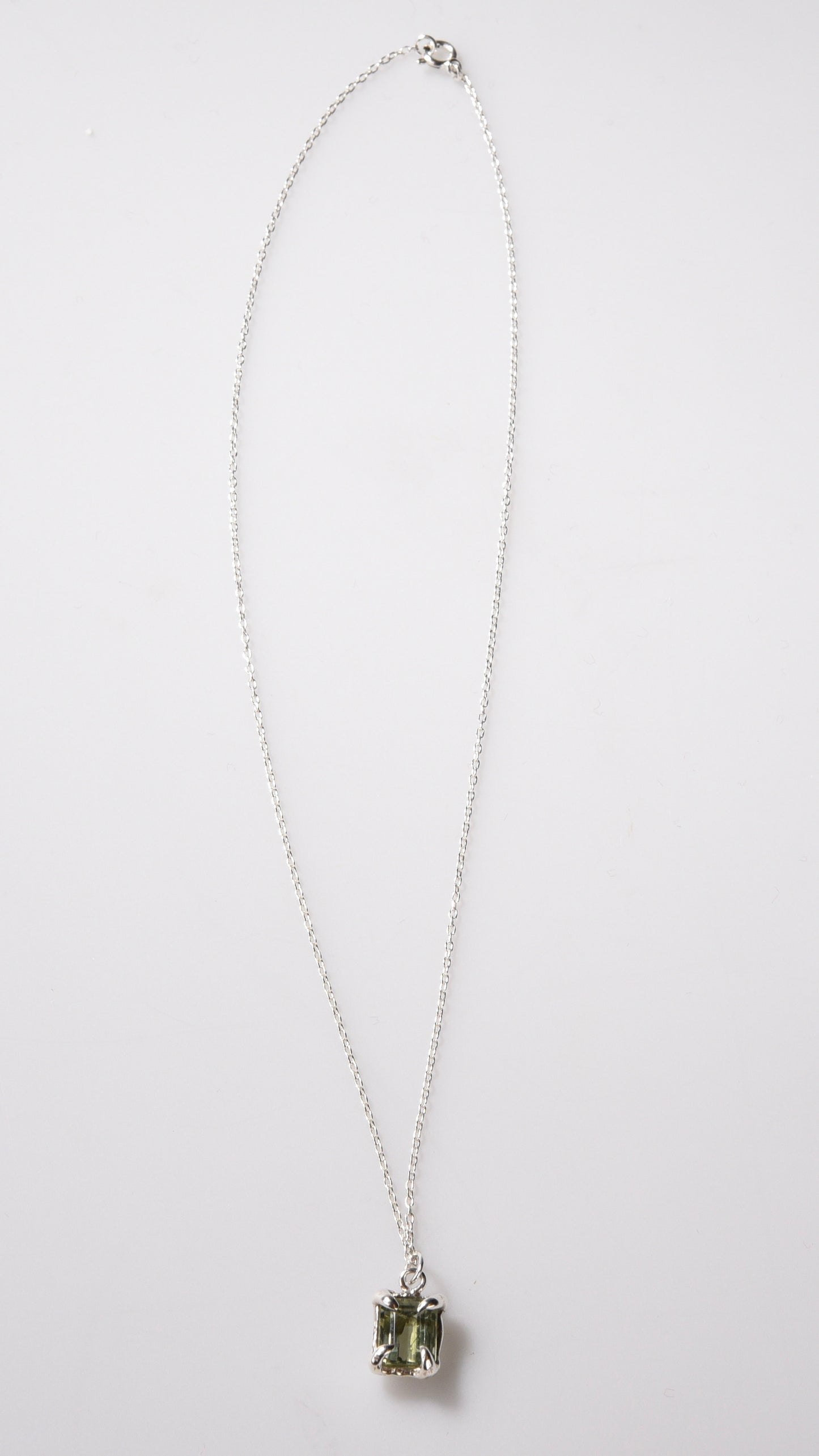 Necklace with a pendant on a white background